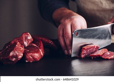 Butcher Hands Close Up: Cutting Meet