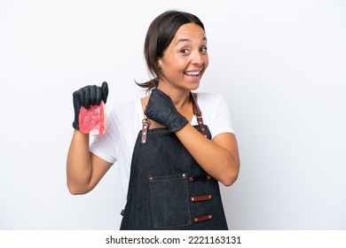 Butcher Hispanic Woman Wearing An Apron And Serving Fresh Cut Meat Isolated On White Background Celebrating A Victory