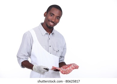 Butcher with a rack of ribs - Powered by Shutterstock