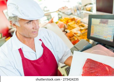 Butcher at work