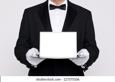 Butler holding a blank card upon a silver service tray, add your own message.