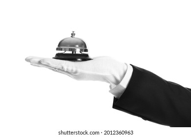 Butler holding service bell on white background, closeup