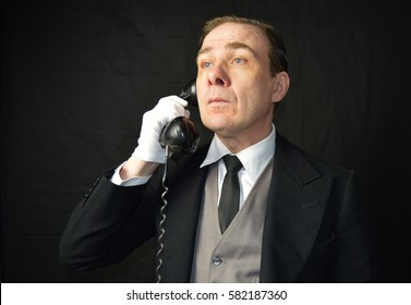 Butler On Phone