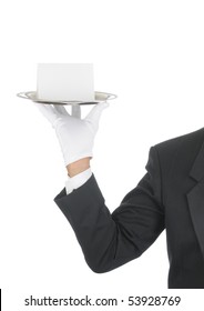 Butler wearing tuxedo and formal gloves holding a Blank Card on a silver tray. Shoulder hand and arm only isolated on white vertical composition.