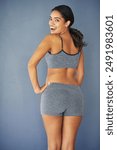 Butt, fitness and portrait of woman in studio for Brazilian lift, plastic surgery and body enhancement. Happy, cosmetics and back of person with bum augmentation aesthetics by gray background.