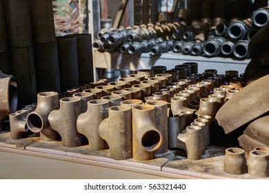 Butt weld equal tee on a shelf in the storage facility