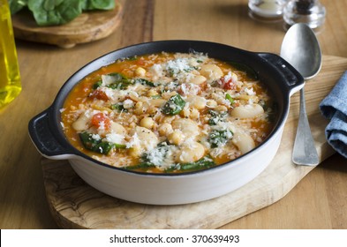 Butter Bean, Chickpea And Spinach Soup Topped With Grated Parmesan