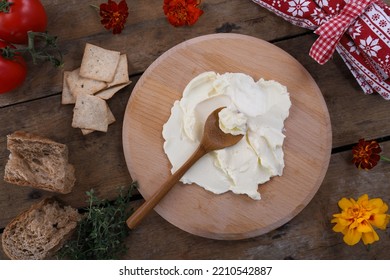 Butter board food trend, butter spread on wooden board ready for toppings - Shutterstock ID 2210542887