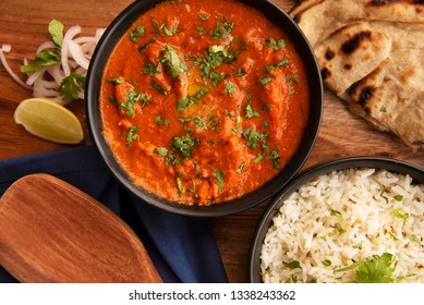 Butter Chicken with rice and roti, food, Pune District, India.
