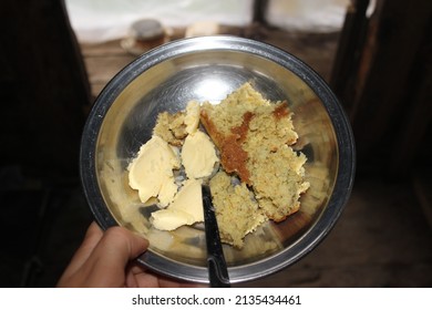 Butter And Cornbread On A Plate