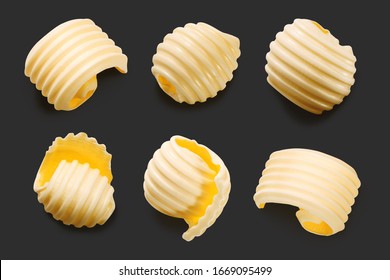 Butter Curls Isolated On Black, Top View