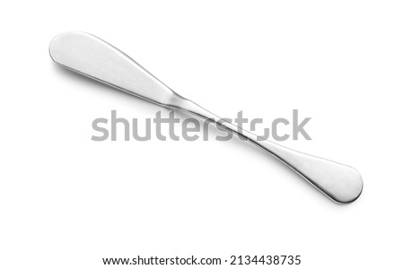 Butter and jam knife made of stainless steel, isolated on white background.