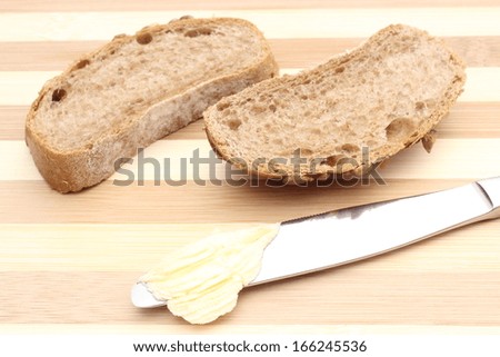 Similar – Foto Bild gebackenes Roggenbrot liegt Mehl auf einem Textiltuch.