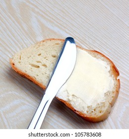 Butter On A Slice Of Bread And Knife