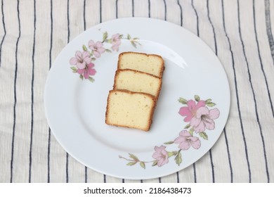 Butter Pound Cake Sliced Isolated,Fruits Cake Plate On Background.