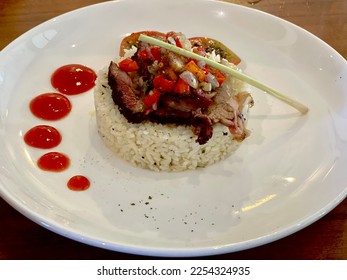 butter rice with beef brisket combined with sambal matah, perfect for lunch, 2023 - Shutterstock ID 2254324935