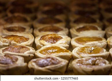 Butter Tarts, Small Size, For Sale On The Shelf Of A Canadian Market Of Toronto. Butter Tart Is Considered To Be One Of The Most Iconic Pastries Of The Cuisine Of Canada

