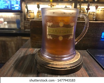 Butterbeer, a glass mug with a refreshing fizzy drink combined with a sweet caramel-like flavor