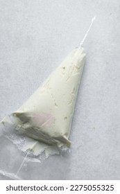 Buttercream in a piping bag, American buttercream in a piping bag for icing cake, frosting for decorating cake