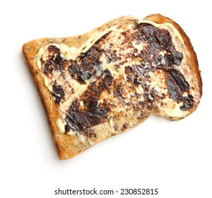 Buttered toast with yeast extract spread.
