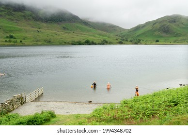 Buttermere, UK - 9 June 2021: Wild Swimming In Buttermere, Lake District, Cumbria 