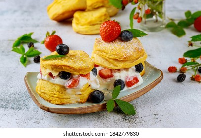 Buttermilk Biscuit In Plate With Berries On White Background.