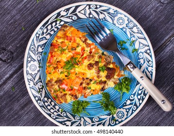 Butternut Squash And Sausage Frittata. Pumpkin, Meat, Red Pepper And Egg Casserole. View From Above, Top Studio Shot