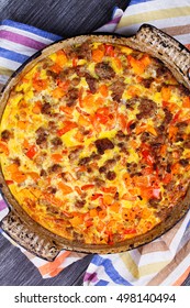 Butternut Squash And Sausage Frittata. Pumpkin, Meat, Red Pepper And Egg Casserole. View From Above, Top Studio Shot