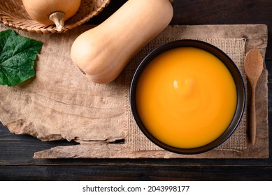 Butternut Squash Soup In A Bowl On Wooden, Table Top View