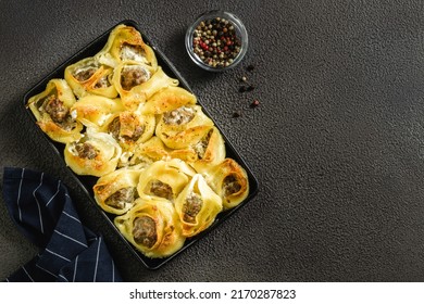 Butternut squash stuffed pasta shells in cast iron skillet. Top view, copy space, flat lay.