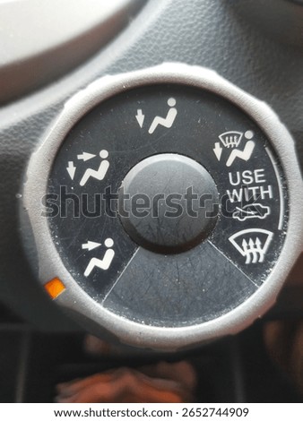 button about the AC in one type of car