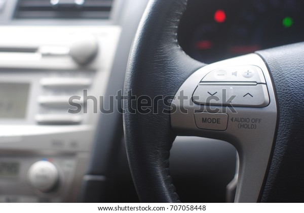 button control\
system on car steering\
wheel