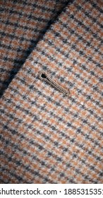 Button Hole In Tweed Jacket