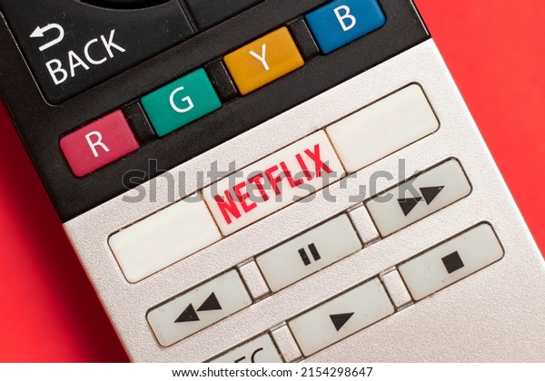 Button with Netflix logo on TV\
remote. Close up Netflix button. ADANA, TURKEY - May 9,\
2022