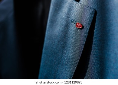 Button on a blue jacket