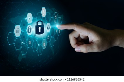 button on virtual screen pressed with finger Global network security world map Key lock security system abstract technology world digital link cyber security hi tech Dark blue background password