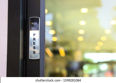 Button For Opening Door In A Coffee Shop Or A Restaurant.