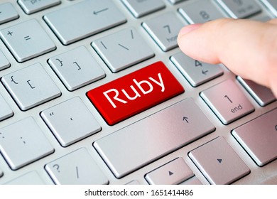button with the ruby on the grey keyboard of a modern laptop. - Shutterstock ID 1651414486