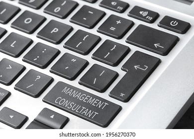Button with text MANAGEMENT CONSULTANT on keyboard, closeup - Shutterstock ID 1956270370