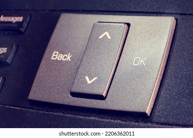 Button With The Text Ok And Back On A Landline Phone In The Office, Close-up