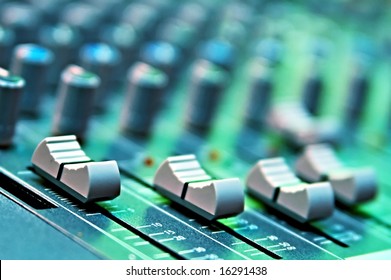 buttons equipment in audio recording studio of the green colour