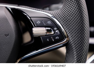 Buttons on steering wheel in a new modern car