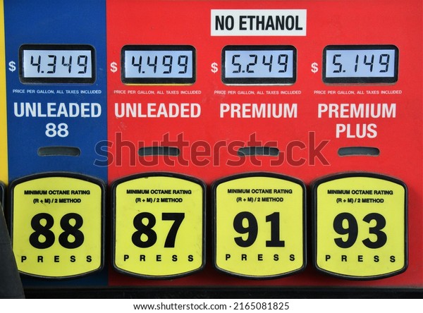 Buttons and prices on a gas\
pump