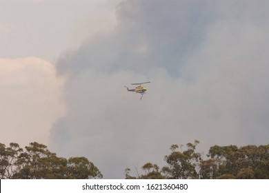 Buxton, NSW/Australia Dec 14 2019 : Green Wattle Creek Spot Fire South Of Buxton Water Bombing Operation. Helitack 430 McDermott Aviation 