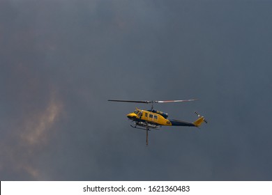 Buxton, NSW/Australia Dec 14 2019 : Green Wattle Creek Spot Fire South Of Buxton Water Bombing Operation. Helitack 430 McDermott Aviation 