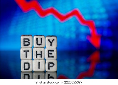 Buy The Dip Concept Dice Letters Red Arrow Down Blue Background - Shutterstock ID 2220355397
