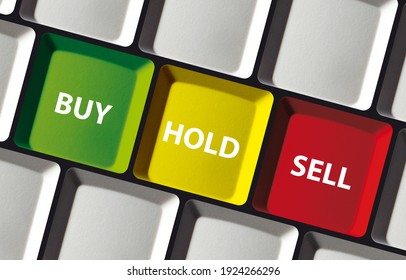 Buy hold sell button on computer keyboard - concept stock exchange invest trade
