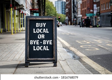 BUY LOCAL OR BYE - BYE LOCAL. Foldable advertising poster on the street - Shutterstock ID 1816768079