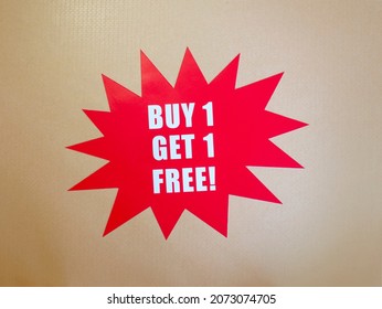 Buy one get one free point of sale sign - Shutterstock ID 2073074705