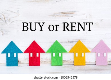  Buy Or Rent Home Concept With Small Houses In A Row